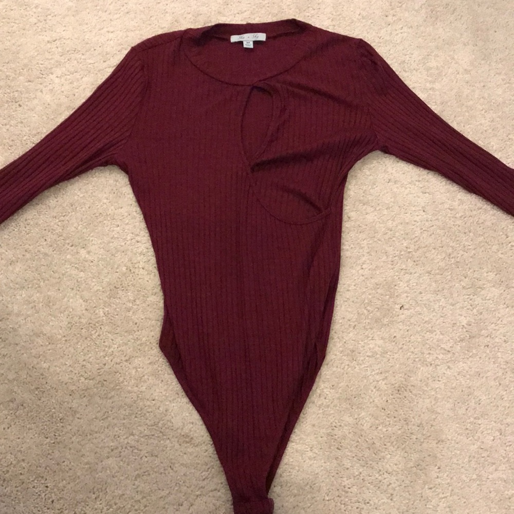 Dark red bodysuit with cut out in center chest